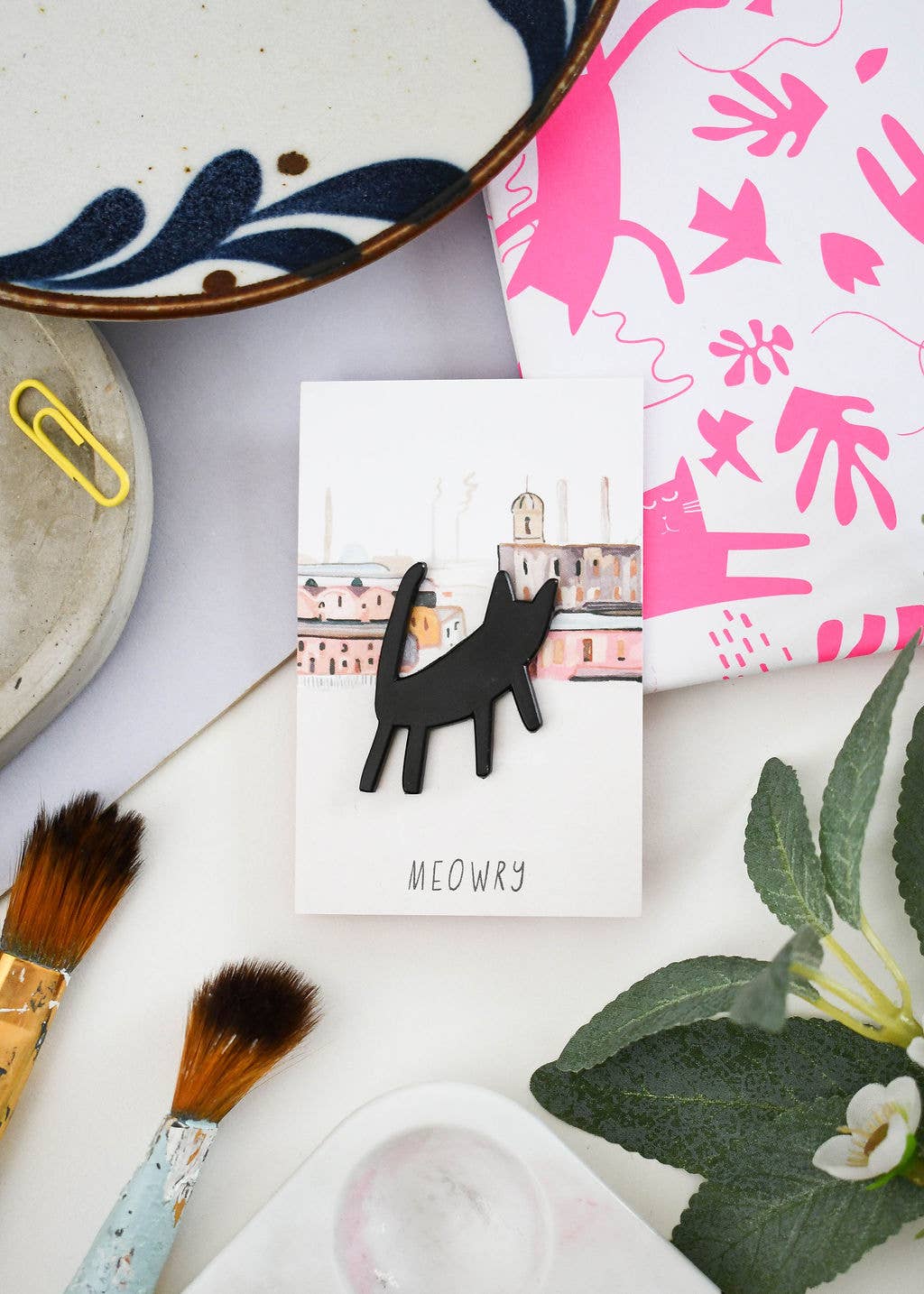 Meowry Matchstick Cat Pin on artistic packaging, perfect accessory for cat and art lovers.