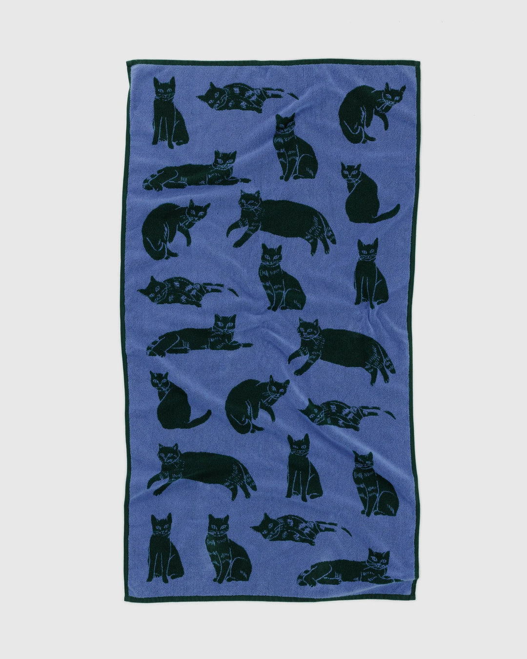 Organic cotton blue and dark green Baggu bath towel with cat designs, measures 60" × 30", reversible, soft, and machine washable.