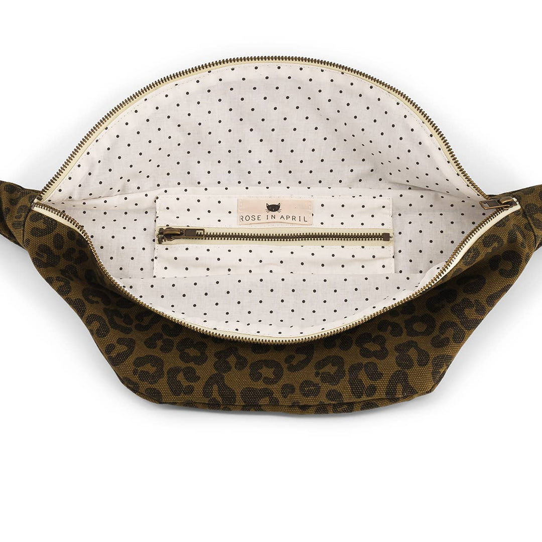 Interior view of BUM BAG GRAOU OLIVE showing leopard print fabric and zippered pocket.