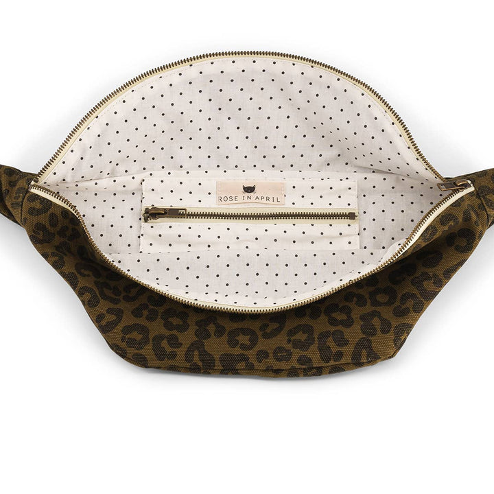 Interior view of BUM BAG GRAOU OLIVE showing leopard print fabric and zippered pocket.