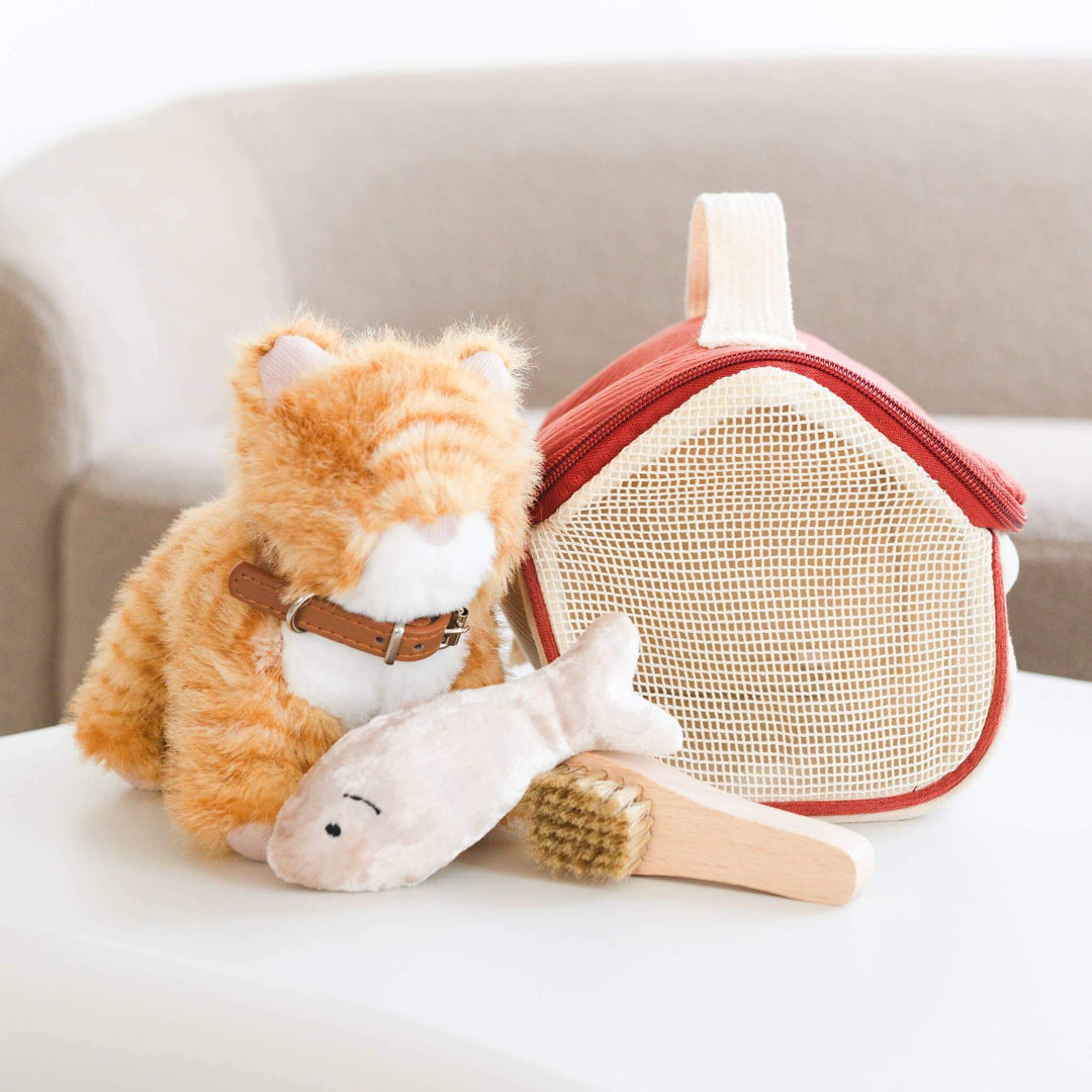 Adorable plush kitty, fish toy, and pet carrier for kids who love cats, perfect for nurturing empathy and imaginative play.