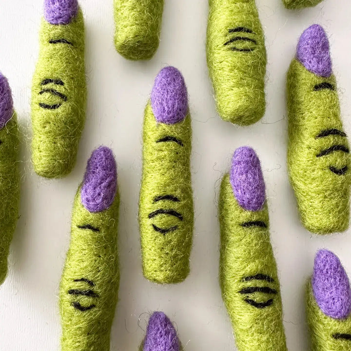 Felted wool witch finger cat toys from Halloween Cat Toy Bundle in green and purple, handmade by fair trade artisans.