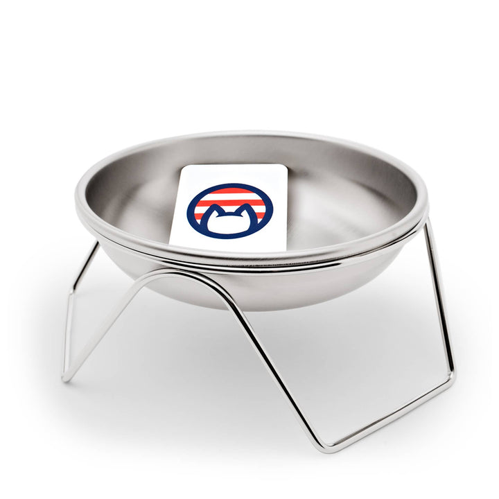 Stainless Steel Raised Cat Bowl &amp; Stand featuring a sleek design with a metal stand and a colorful cat logo.