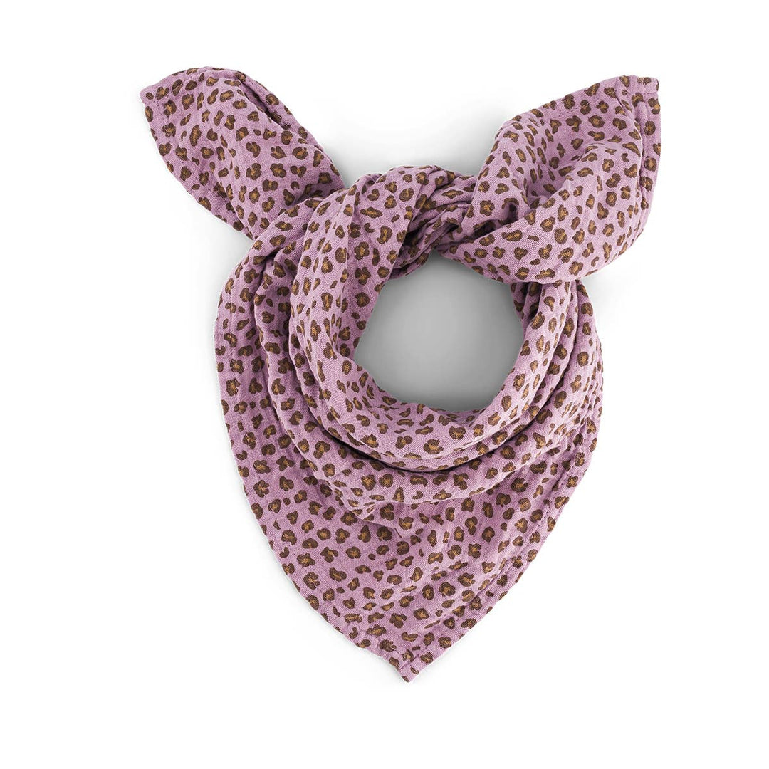 Bianca Swaddle in lilac leopard print, versatile baby blanket, swaddle, and burp cloth, crafted from 100% cotton muslin.