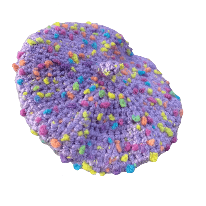 Handcrafted purple crochet cat beret hat with colorful specks, perfect for stylish feline fashion.