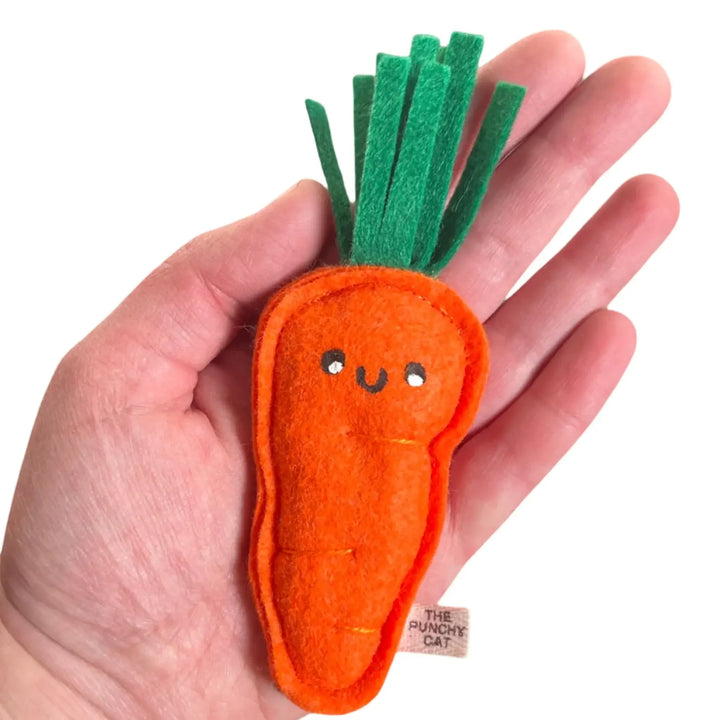 Handmade catnip carrot toy, orange felt, vibrant smiley face, organic filling, perfect for playful cats.