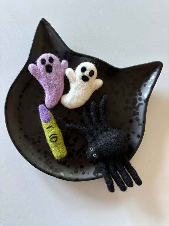 Halloween cat toy bundle including a spider, purple ghost, white ghost, and witch finger in a cat-shaped dish. Perfect cat toys for Halloween.