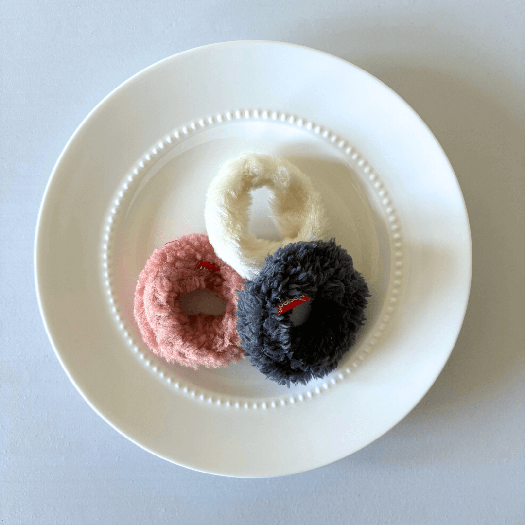 Set of 3 colorful plush Mini Donuts cat toys on a plate, designed to crackle for exciting pet play.