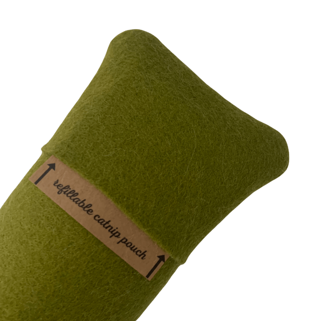 Refillable catnip pouch on a wool felt cat kicker designed for playful cats.