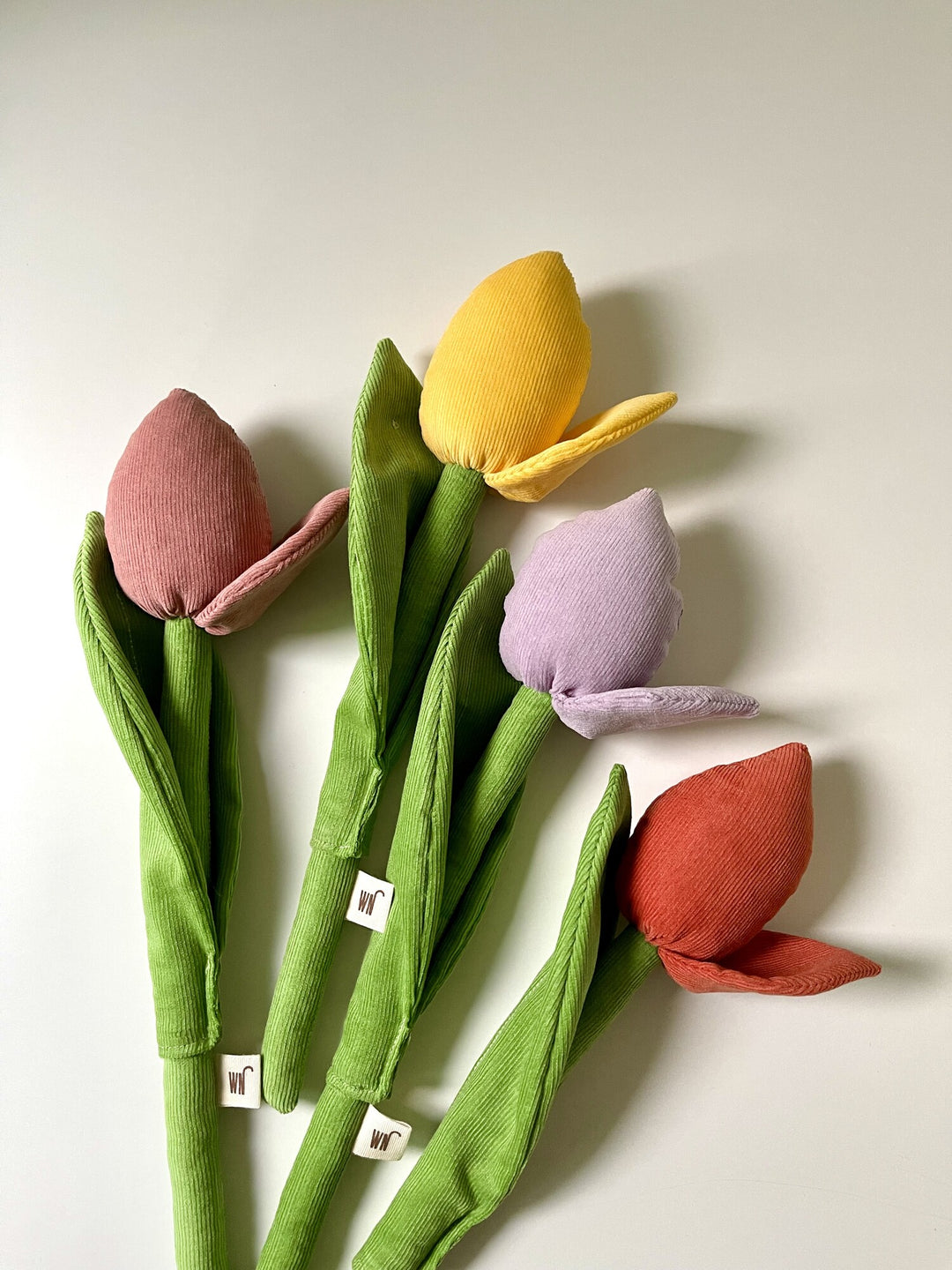 Four colorful tulip-shaped stylish catnip toys made from corduroy fabric, ideal unique cat toy for playful pets.