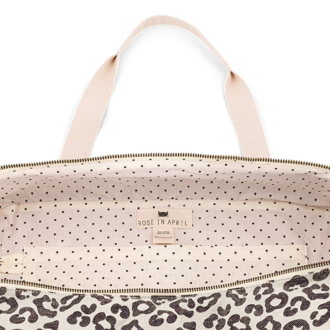 Inside view of the Raphael Graou tote bag featuring a leopard print and polka dot lining.