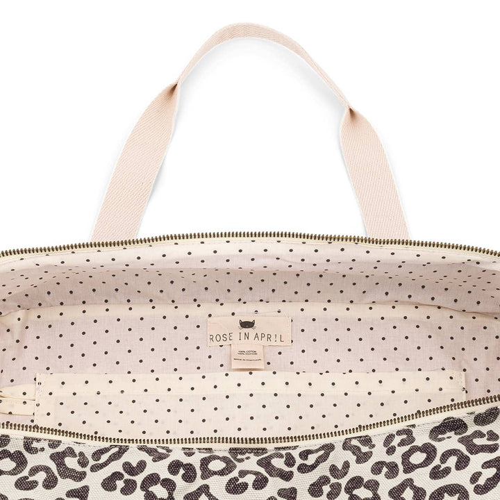 Inside view of the Raphael Graou tote bag featuring a leopard print and polka dot lining.
