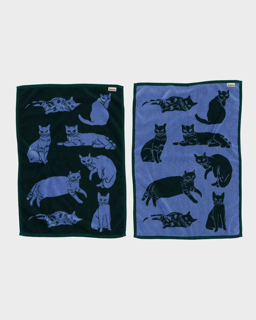 Set of two organic cotton hand towels with cat designs in blue and dark green, measure 30x20 inches, reversible and machine washable.