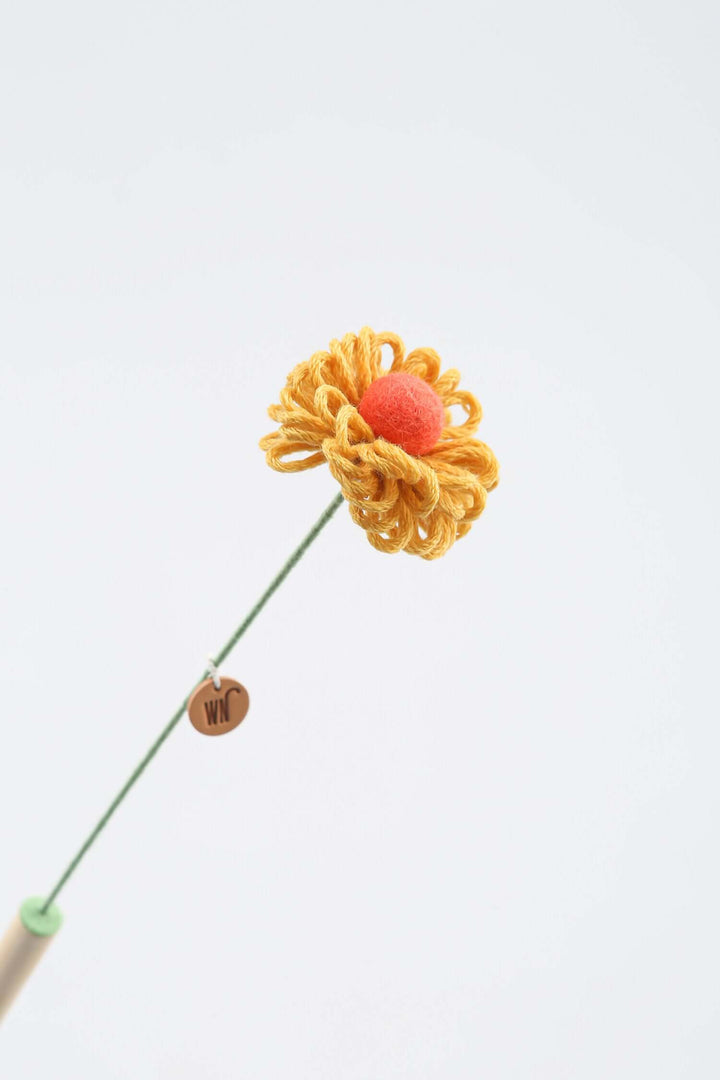 Cute flower stem cat toy made from wool, designed for playful cats. Perfect for engaging with catnip. Handmade in South Korea.