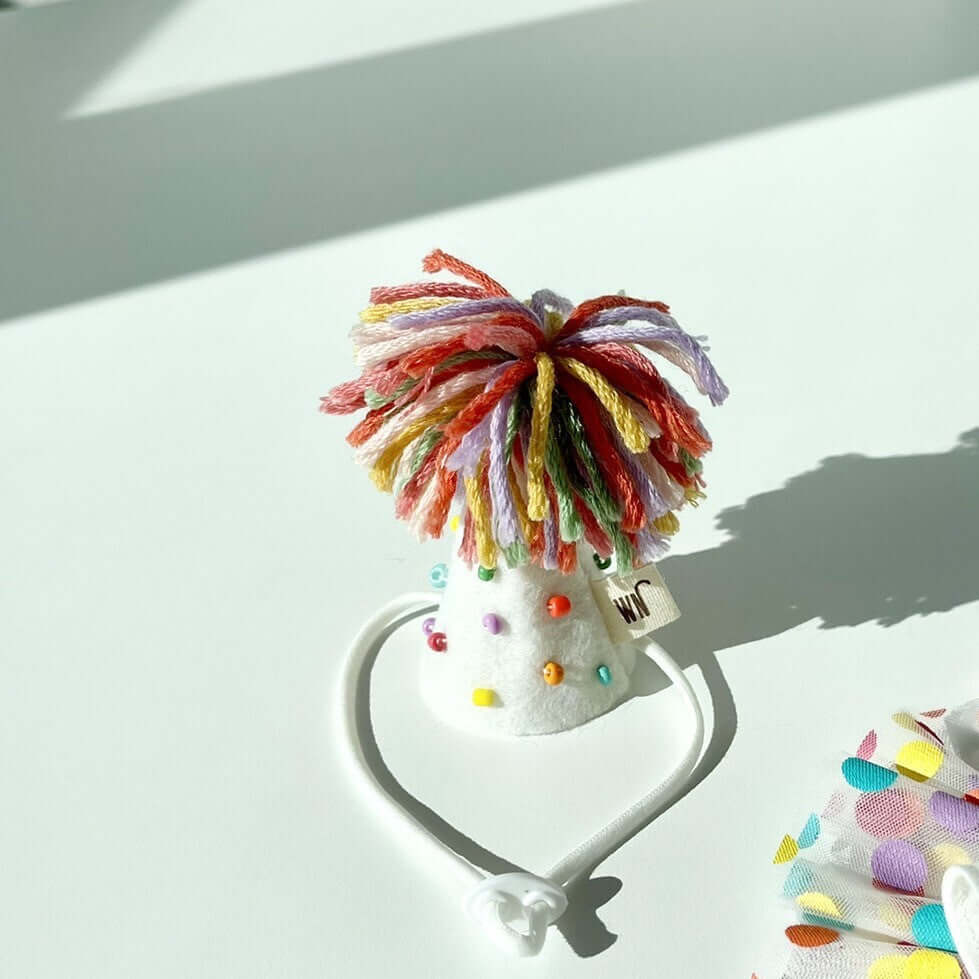 Colorful Pierrot cat party hat with yarn pom-pom, handmade in South Korea, perfect for cat apparel and celebrations.