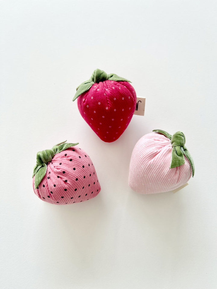 Set of 3 strawberry-shaped handmade catnip toys in pink and red, designed with corduroy fabric and velvet ribbon for cats to enjoy.