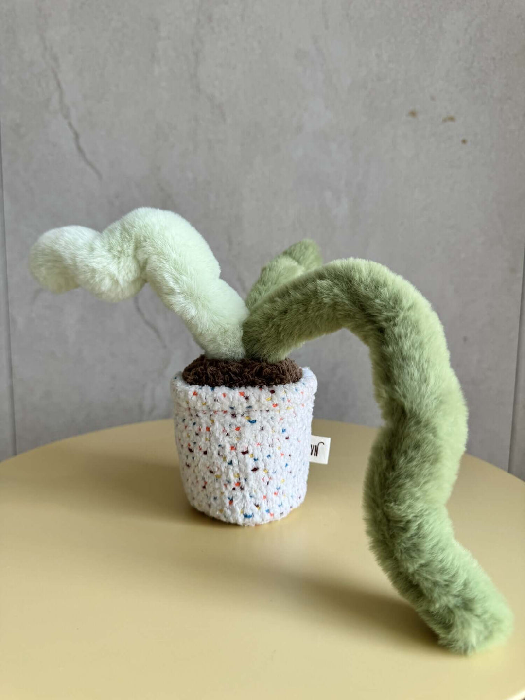 Monkey Tail potted catnip plant, a cute cat toy made of soft fabric for playful cats.