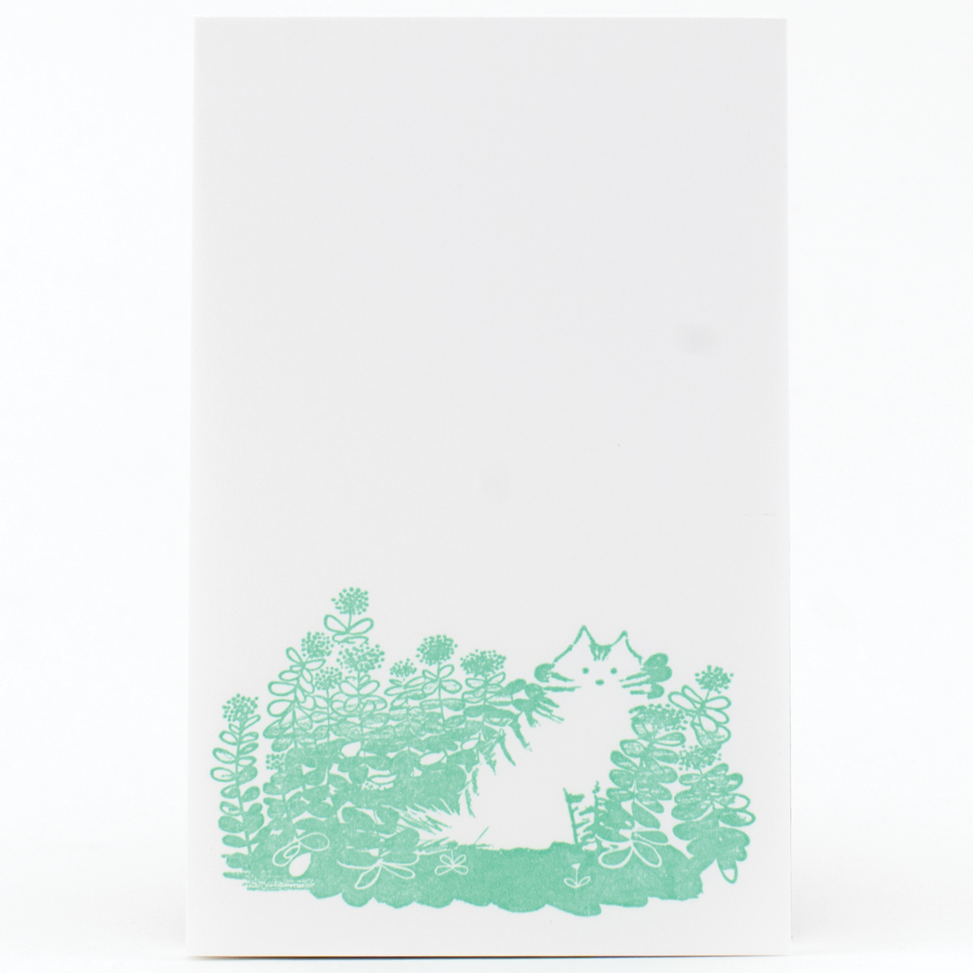 Mint letterpress notepad with fluffy cat hiding in green flower garden, 60 tear-off sheets, 3.5 x 5.5 inches, by guest artist e.b. goodale.